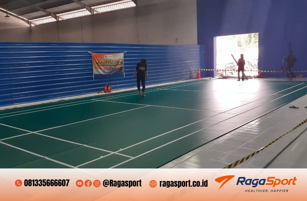 pengecatan lapangan badminton sesuai BWF
